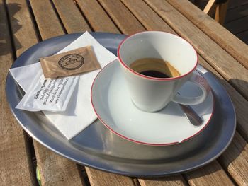 High angle view of coffee cup on table