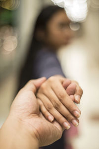 Close-up of couple hands