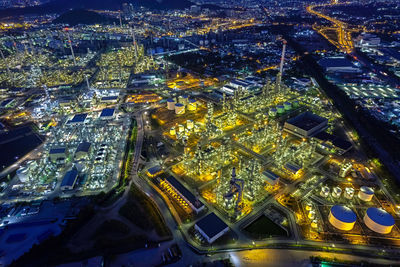 High angle view of illuminated cityscape at night