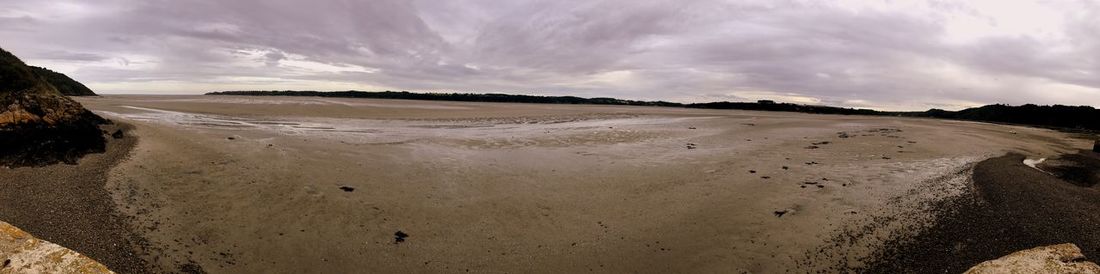 Panoramic view of beach against sky