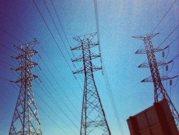 Low angle view of electricity pylon