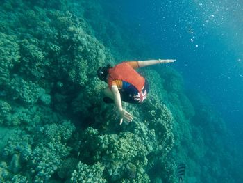 Full length of girl swimming in sea