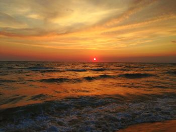 Scenic view of sea at sunset