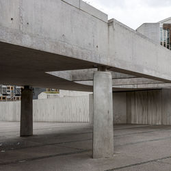 Low angle view of bridge in city