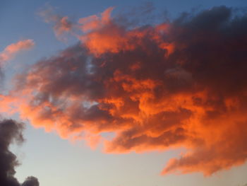 Low angle view of cloudy sky during sunset