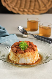 Homemade nasi tim ayam, steamed rice with diced chicken soy sauce.