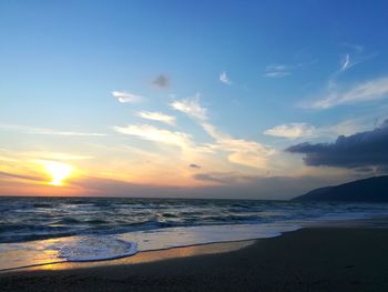 Scenic view of sea against sky during sunset