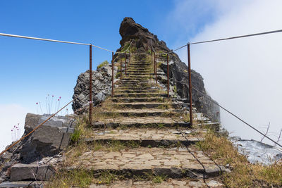 Low angle view of staircase against sky