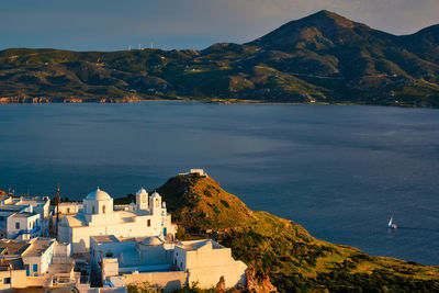 View of plaka village on milos island on sunset in greece