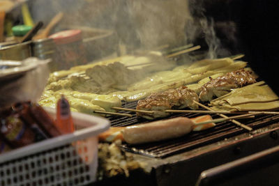 Close-up of meat on barbecue grill