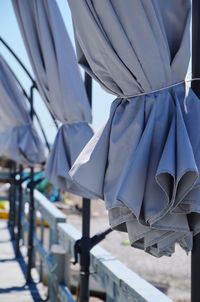 Low angle view of decoration hanging against white wall