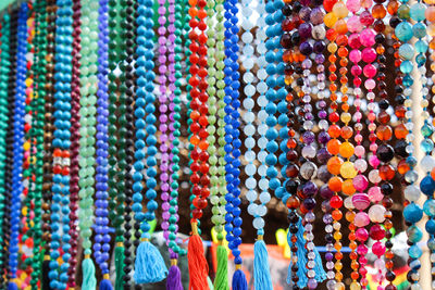 Colorful gemstone rosary on indian market in goa