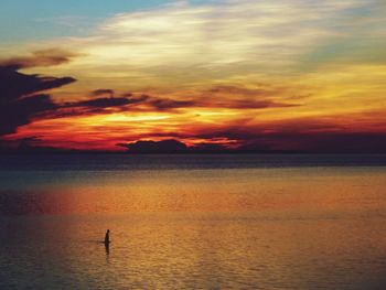 Scenic view of sea at sunset