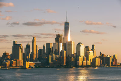 View of new york city skyscrapers at sunset