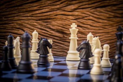 Close-up of chess pieces on board