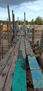 High angle view of abandoned construction site against sky