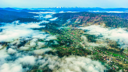 Nature landscape fog valley, mountains, high angle viewpoint. fog, cloud over city, mountain morning