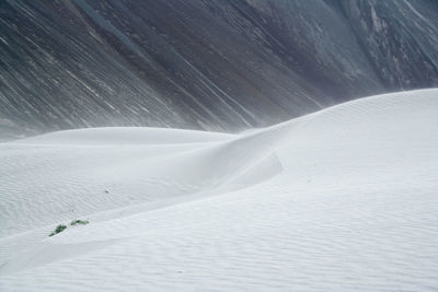 Scenic view of snow against sky