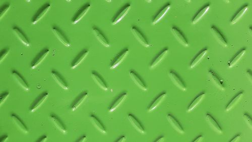 Green background with zig zag pattern