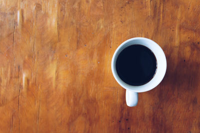 Directly above shot of black coffee on table