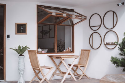 Table and chairs outside home