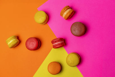 Directly above shot of pills on yellow background