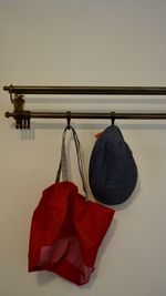 Close-up of clothes hanging on wall