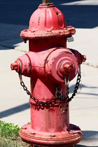 Close-up of fire hydrant on sidewalk