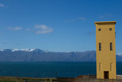 Scenic view of sea against blue sky