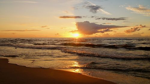 Scenic view of sea against sky during sunset