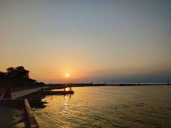 Scenic view of sea against sky during sunset