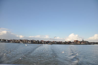 Scenic view of sea against blue sky