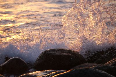 Close-up of rocks in water