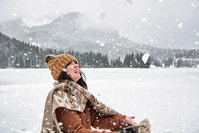 Young woman having fun in winter. snow, outdoors, happy.