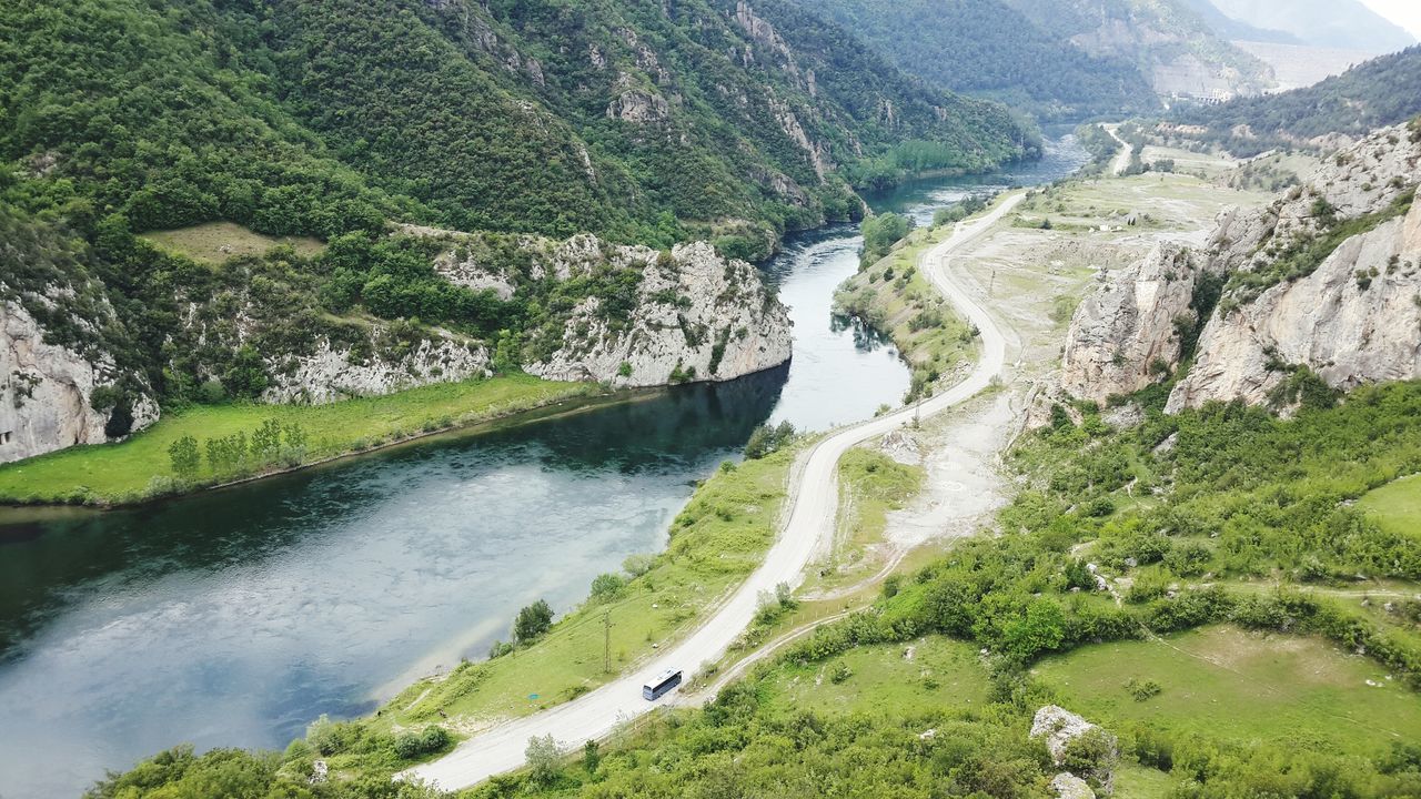 SCENIC VIEW OF RIVER AND MOUNTAINS