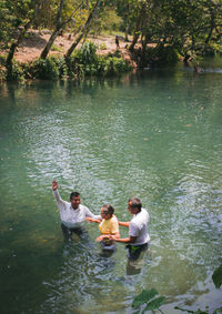 Men kayaking in lake