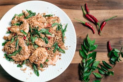 High angle view of vegetables in plate on table