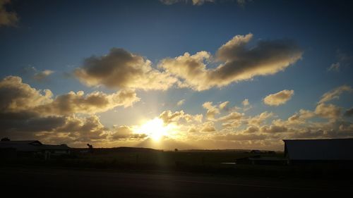 Sun shining through clouds