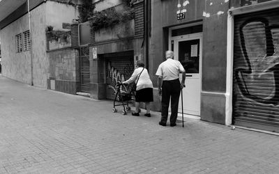 Full length of woman standing in city