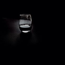 Close-up of glass over white background