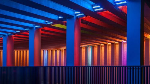 Multi colored lights on ceiling of building