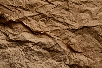High angle view of paper on bed