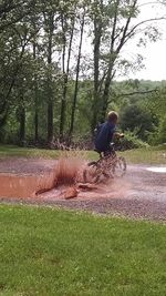 Man cycling in park