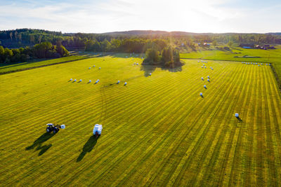 High angle view of people on field against sky