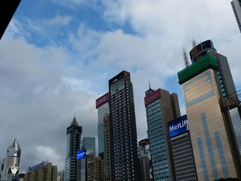 Low angle view of skyscrapers against sky