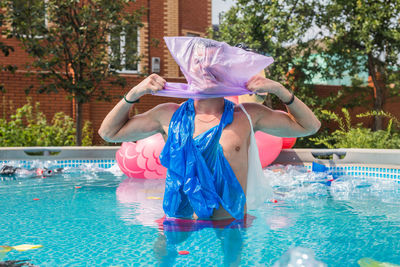 People holding swimming pool