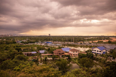 High angle view of townscape against sky during sunset