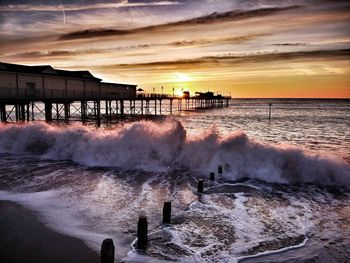 Scenic view of sea against sky during sunset