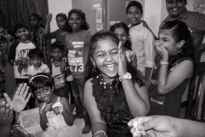 Cheerful girl in birthday party