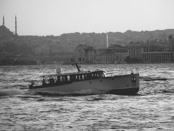 Boats sailing in river